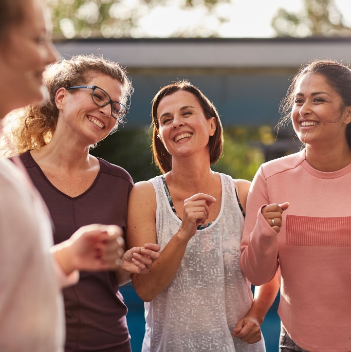 Happy WeightWatchers women members exercising 